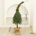 Whimsical curved green Christmas tree tabletop ornament with pine cones and berries - 63cm / Bent Green With Decoration