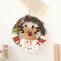 Rustic Christmas reindeer rattan ring wreath with plush Santa face and festive red berries - Santa Holding Tree