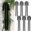 Set of 6 black velvet Christmas bows with long ribbons for holiday garland decor. - Black