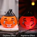 Glowing Halloween pumpkin lantern with witch hat and smiling emoji face - Handheld Starry Pumpkin Light C