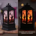 Halloween LED wind lantern showing day and night lighting effects with spooky design. - Large Square Flame Ghost Hand Lantern