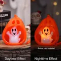 Halloween pumpkin ghost LED light showing day and night effects - Handheld Ghost Pumpkin Light