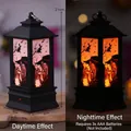 Halloween LED lantern with witch pattern, showing day and night lighting effects - Large Square Flame Witch Lantern