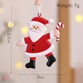 Hanging iron Santa Claus metal pendant holding a candy cane for Christmas tree decor - Santa Carrying Candy Cane