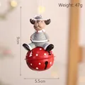 Festive Christmas reindeer ornament on a red metal bell, 9cm high and 5.5cm wide - Bell Reindeer
