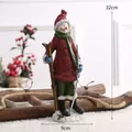 Bezaubernde handgefertigte Skifahren Schneemann Weihnachtsfigur im roten Pullover, 32cm hoch - Schneemann mit Skateboard / Höhe 32cm
