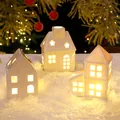 Set of three glowing white ceramic Nordic Christmas house decorations with warm LED light - White Ceramic 3-Piece Set
