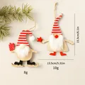 Houten kerstkabouter ornamenten met rood gestreepte hoeden, hoogte 15,5 cm details - Gestreepte Muts Kabouter Ster en Cadeau Set