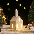 Elegant white Nordic ceramic glowing house Christmas ornament set in a snow scene - Classic Spire