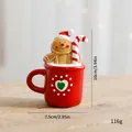 Figurine de bonhomme de pain d'épices de Noël dans une tasse rouge décoration - Décorations de Noël / Décoration Tasse à Thé Bonhomme de Pain d'Épices