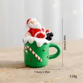 Figurine de Père Noël en résine sur tasse verte, ornement décoratif de Noël, taille 10 cm - Décorations de Noël / Décoration Tasse à Thé Père Noël