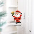 Décoration de Noël suspendue Père Noël en fer forgé avec cadeau, hauteur 10 cm - Père Noël - Paquet cadeau vert