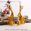 Statues de famille de chats en résine jaune à long cou pour décorations de Noël - Famille de Chats Ensemble de 3 Pièces