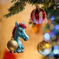 Close-up of a blue cartoon horse ornament with a golden ball hanging on a Christmas tree. - Cartoon Horse Style 02