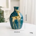 Exquisit teal-keramische Weihnachtsvase mit goldenem Hirschrelief und Texturfinish - L / Vase / Blauer Elch
