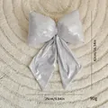 Grande décoration de Noël nœud argenté métallisé, ornement suspendu de 42 cm - Nœud / Métallisé Argent 28cm