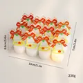 Variante de bougies chauffe-plat LED de Noël blanches lot de 12 avec cloches festives - Lot de 12 / Cloche