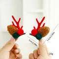 Set di fermagli per capelli con corna di renna di Natale e pompon colorati festivi - Rosso
