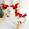 Cerchietti decorativi per renne di Natale in due dimensioni con fiocchi rossi - Corna Rosse Adulti + Bambini