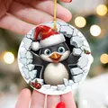 Detailed view of flat acrylic Christmas ornament featuring a cute penguin in a Santa hat - Creative Penguin Style 03