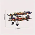 Detailed view of a vintage biplane Christmas ornament showing 8cm x 5cm size dimensions - Vintage Biplane (6)