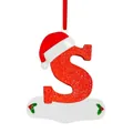 Close-up view of red glittery Christmas letter S ornament with a cute Santa hat. - S