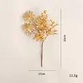 Ramo di fiori di Natale artificiale dorato con foglie di monstera e bacche, 25 cm - Ramo di Foglie e Bacche Dorate
