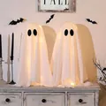 Lit-up tall white Halloween ghost decorations with warm LED lights for indoor festive setup - 2 Pieces / 2 Pieces