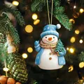 Detailed view of an acrylic Christmas snowman ornament hanging on a festive tree - Christmas Snowman Style (2)