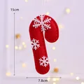 Roter Filz-Weihnachts-Zuckerstangen-Schmuck mit weißen Schneeflocken und Maßen - Zuckerstange-Schneeflocke