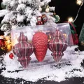 3er-Set rote Weihnachtsornamente mit Tannenzapfen- und Rippendesign in Klarsichtbox. - Laternen-Zapfenball-Set / Rotbraun