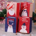 Juego de 4 bolsas de papel pequeñas para regalo de Navidad con diseños de Papá Noel y pingüino - Estilo B (Tamaño Pequeño) / Juego de 4