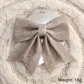 Grote champagne glitter strik voor DIY kerstboom versiering en binnenhuis decoratie - Zilver Middel / 1 Stuk