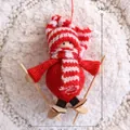 Handcrafted red and white knitted Christmas skiing snowman doll for holiday decor - Model J Skiing Figure