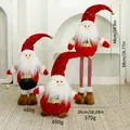 Pupazzi di Babbo Natale con paillettes rosse in tre misure con pesi e dimensioni - Famiglia di Babbo Natale