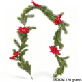 Detailed view of a 180cm artificial Christmas pine garland with red poinsettia flowers - 1.8m Pine Garland (Green with 5 Poinsettias) / 68 Tips