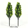 Detail view of two artificial green pine needle stakes for outdoor Christmas decor - Dual Green Pine Needle With Stake