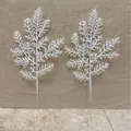 Close-up view of two white artificial pine branches for Christmas DIY tree decor. - Pine and Cypress Leaves / 28cm / White