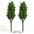 Detailed view of two 60cm green artificial Christmas pine needle stakes for outdoor garden decor - Green Pine Needle With Stake