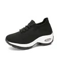 Side view detail of women's black knitted rocking sneakers with white air cushioned sole - Black and White