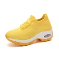 Detailed view of yellow flyknit women's sneakers with air cushion sole - 35 / Yellow
