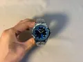 Men's Y2K style watch featuring blue dial and silver wormhole concept metal strap - Silver Blue