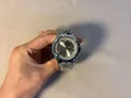 Silver futuristic Y2K style men's quartz watch with a unique wormhole concept design - Silver Gray