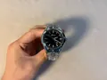 Y2K millennium style men's silver watch with a unique wormhole design metal band - Silver Black