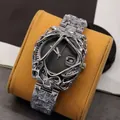 Reloj único de aleación de plata con diseño de calavera calada y visualización de fecha - Banda Plateada Esfera Negra Con Lupa