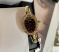 Elegante reloj de brazalete dorado SUNLIFEX para mujer con esfera ovalada de strass - Estilo Ovalado / Oro Negro Con Strass