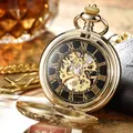 Montre à gousset mécanique dorée avec cadran squelette et chiffres romains - Or