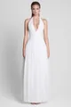 Elegant white halter-neck evening gown with deep V-neck and flowing skirt detail. - XS / Dresses / White