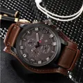 Trendy men's sports watch featuring a large brown dial and wide leather cuff strap. - Brown Strap White Needles