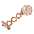 Elegante Krankenschwesternuhr in Roségold mit Kristalllünette und Kettengliedern. - Roségold Stil 9